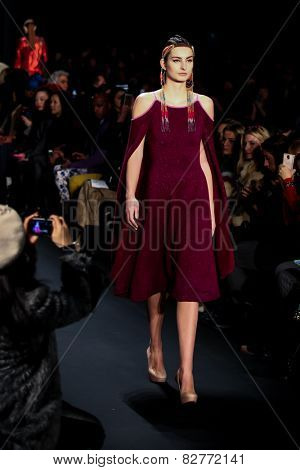 NEW YORK - FEBRUARY 13: A model walks the runway at the Mongol Fall/Winter 2015 collection during Mercedes-Benz Fashion Week in New York on February 13, 2015.