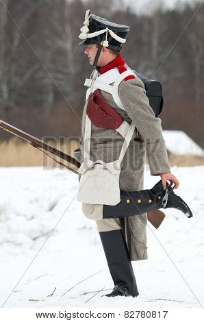 Russian Soldier Clean A Jackboot