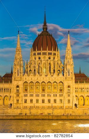 Budapest Parliament Building Illuminated During Sunset With Danube River, Hungary, Europe