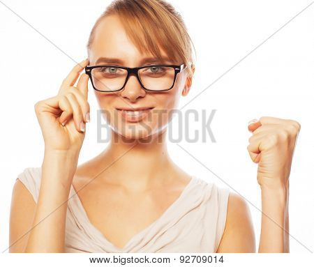 Business, finance and people concept: young business woman in glasses