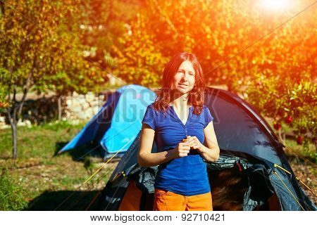 young woman near the tent