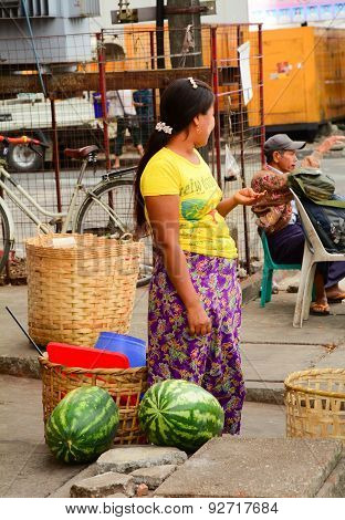 Burmese Women Selling Fresh Fruits At Bogyoke Market