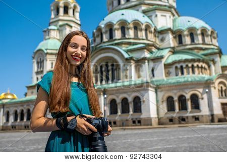 Tourist near the St. Alexander Nevsky Cathedral