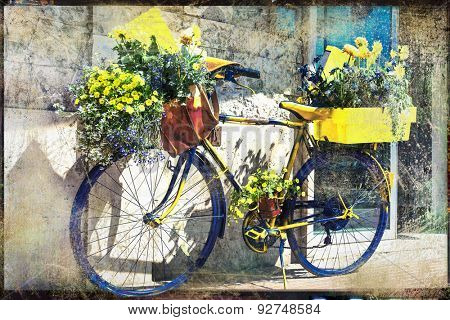 vintage bicycle decorated with flowers, artistic retro picture