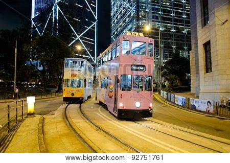 HONG KONG - JUNE 03, 2015: double-decker tram on street of HK. Hong Kong Tramways is a tram system in Hong Kong, being one of the earliest forms of public transport in the metropolis