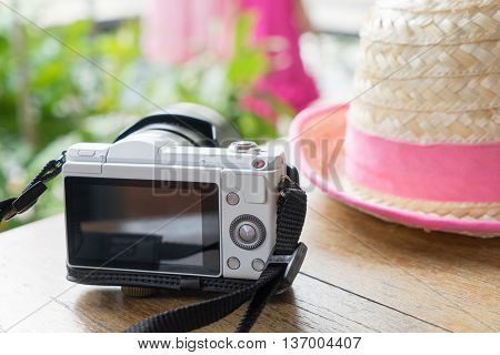 Farmer Hat with Camera for summer Vacation background.