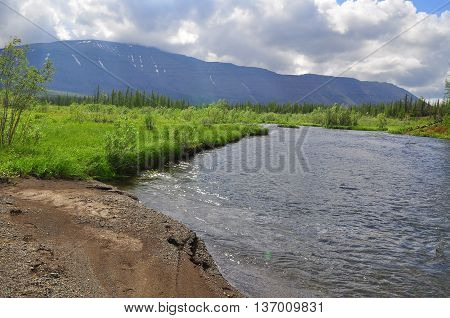 Water landscape wildlife Taimyr. Mountain river on the Putorana plateau.