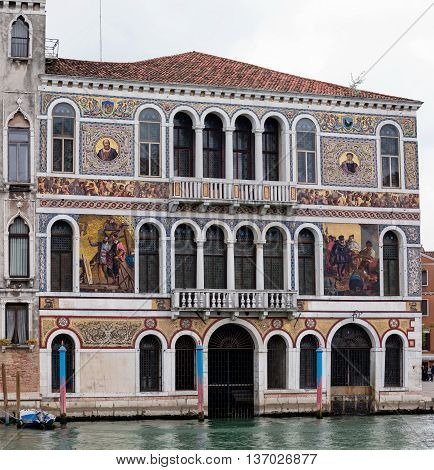 VENICE ITALY - MAY 1 2016: 16th century Palazzo Barbarigo is one of the more opulent palaces on the Grand Canal distinguished by its mosaics of Murano glass applied in 1886.