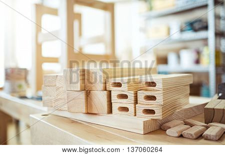 Stool making in woodworking workshop.