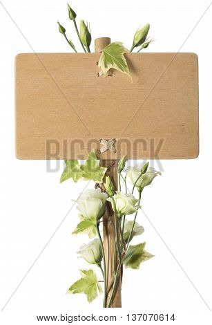 Wooden sign over white background with roses flowers sourrounding the post. Concept for advertising and communication purposes