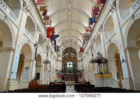 PARIS - MAY 13: Saint Louis des Invalides chapel interior on MAY 13, 2015 in Paris. It is the the burial site for France's war heroes including Napoleon Bonaparte.