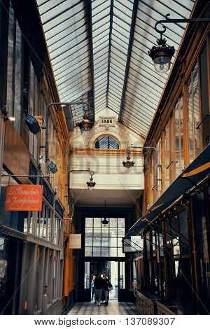 PARIS, FRANCE - MAY 13: Passage Jouffroy street view on May 13, 2015 in Paris. With the population of 2M, Paris is the capital and most-populous city of France