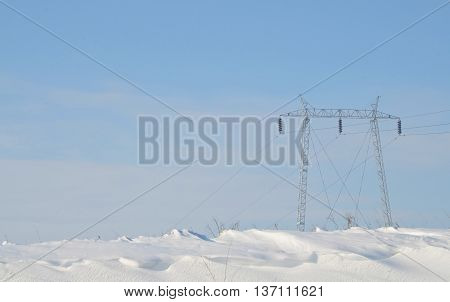 Power distribution, high voltage power pole in winter