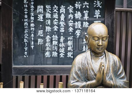 The Nade Botoke sculpture in Senso-ji Temple, Tokyo