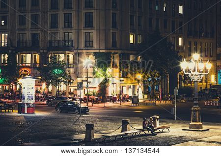 Berlin Germany - July 5 2016: Restaurants at the Gendarmenmarkt at night in Berlin Germany.