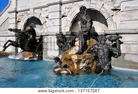 Washington DC - April 12 2014: Beaux arts Neptune Fountain by Roland Hinton Perry stands in front of the Library of Congress on First Street SE *