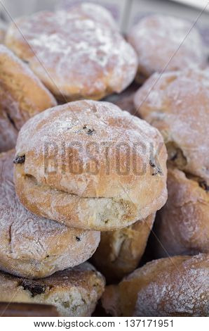 Closeup pile of fresh Irish tea scones arranged in basket