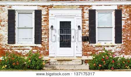 Antique Front Door Windows Shutters and Flower Bed in Columbus Ohio German Village
