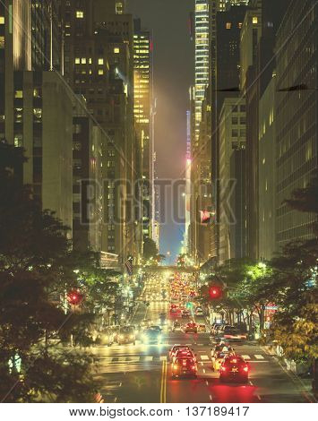 42nd Street in New York City with Grand Central and Times Square in the distance, focus in mid area of image with retro filter