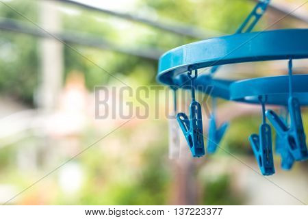 Plastic clothes pegs in blur background, washing, home work