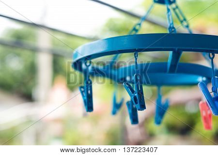 Plastic clothes pegs in blur background, washing, home work