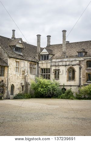 LACOCK ABBEY, LACOCK, WILTSHIRE, UK, 21 JUNE 2016 - Part of the Tudor courtyard at Lacock Abbey Wiltshire UK