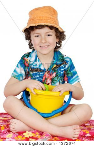 Adorable Boy Playing In The Beach