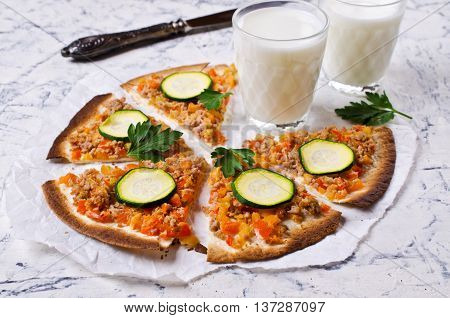Traditional Asian thin tortilla with minced meat and vegetables. Selective focus.