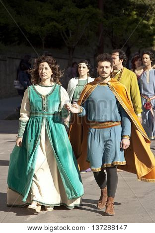 Enna, Italy - May 2016:  People take part in the medieval costume parade along the street. Tenth Edition of Historical Parade, 15 may 2016, Enna, Sicily