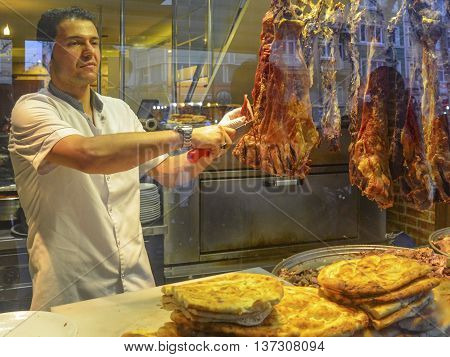 Istanbul Turkey - January 26 2014: Istanbul a famous boulevard with Women Market Buryan kebab in Zeyrek district. Buryan Puryan or Biryan also called Turkey's made in many parts of Bitlis Siirt and a meat dish. Perive also called in Arabic. Kebab is a der