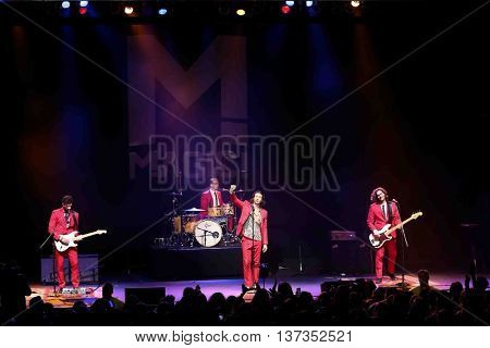 HUNTINGTON, NY-MAR 7: (L-R) Mark Pellizzer, Alex Tanas, Nasri and Ben Spivak of the reggae fusion band Magic! performs in concert at The Paramount on March 7, 2015 in Huntington, New York.