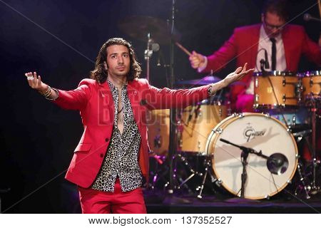 HUNTINGTON, NY-MAR 7: Singer Nasri (L) of the reggae fusion band Magic! performs in concert at The Paramount on March 7, 2015 in Huntington, New York.