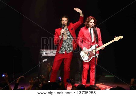 HUNTINGTON, NY-MAR 7: Singer Nasri (L) and Ben Spivak of the reggae fusion band Magic! performs in concert at The Paramount on March 7, 2015 in Huntington, New York.