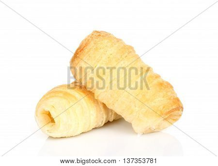 Croissant with sweet cream on a white background