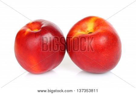 Nectarine fruits on a white background close-up
