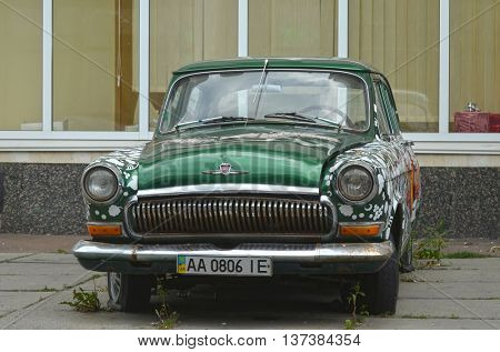  Exterior of the vintage Soviet car GAZ-21 Volga with folk stile tuning. July 6, 2016 in Kiev, Ukraine