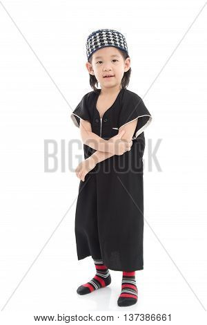 Cute muslim chlid on white background isolated.