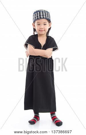 Cute muslim chlid on white background isolated.
