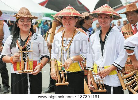 SIPITANG SABAH MALAYSIA - August 30 2014 : A group of Lundayeh in their traditional costume during folklore festival call GaTa festival in Sipitang Sabah Malaysia. Lundayeh tribe is one of Sabah ethnic mostly reside in the interior.