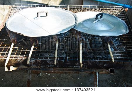 Many grilled snakehead fish covered by salt