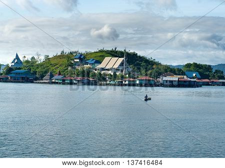 Houses On An Island On The Lake Sentani, New Guinea