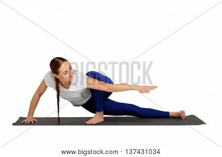 yoga exercise isolated on white background. Beautiful woman dressed in sportswear practicing sports
