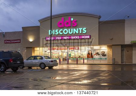 DALLAS TX USA - APR 17 2016: Exterior of the dd's discounts fashion store illuminated at night. Texas United States