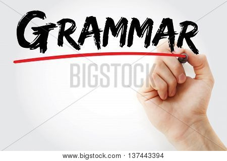 Hand writing Grammar with marker education concept background