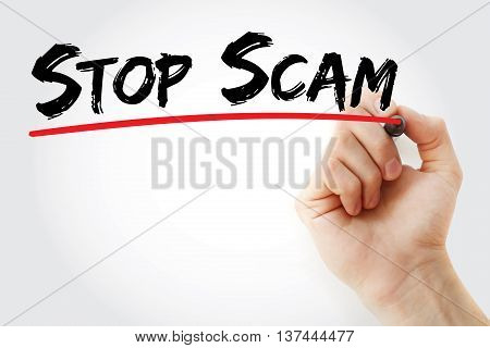Hand Writing Stop Scam With Marker