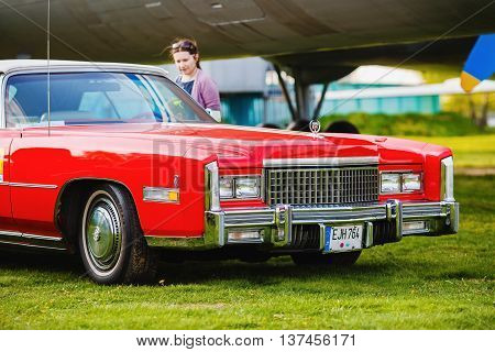 MINSK BELARUS - MAY 07 2016: Close-up photo of the red Cadillac Eldorado 1976 model year. Vintage retro car. Selective focus.