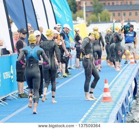 STOCKHOLM - JUL 02 2016: The female swimmers warming up before the start in the Women's ITU World Triathlon series event July 02 2016 in Stockholm Sweden