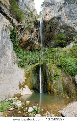 waterfall water rock green water nature stone