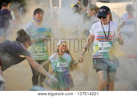 MAMAIA, CONSTANTA, ROMANIA - AUGUST 1: Mamaia color run 2015, in Mamaia, Constanta, on August 1, 2015. People from all walks of life participating in the fun colored summer run