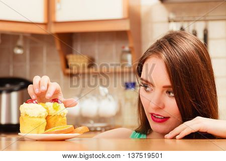 Woman Eating Delicious Sweet Cake. Gluttony.